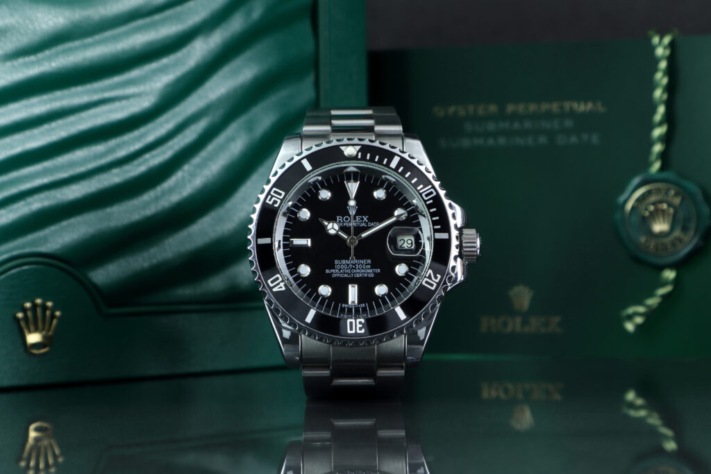 genuine rolex watch in front of the iconic green rolex box