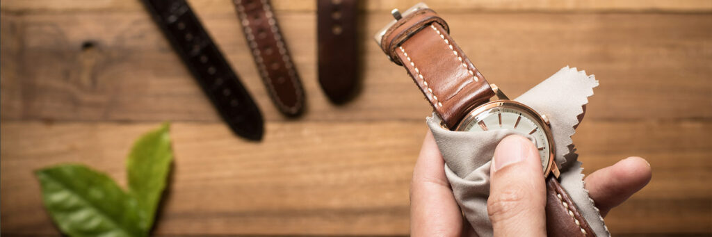 wiping a luxury watch as a part of diy watch care tips